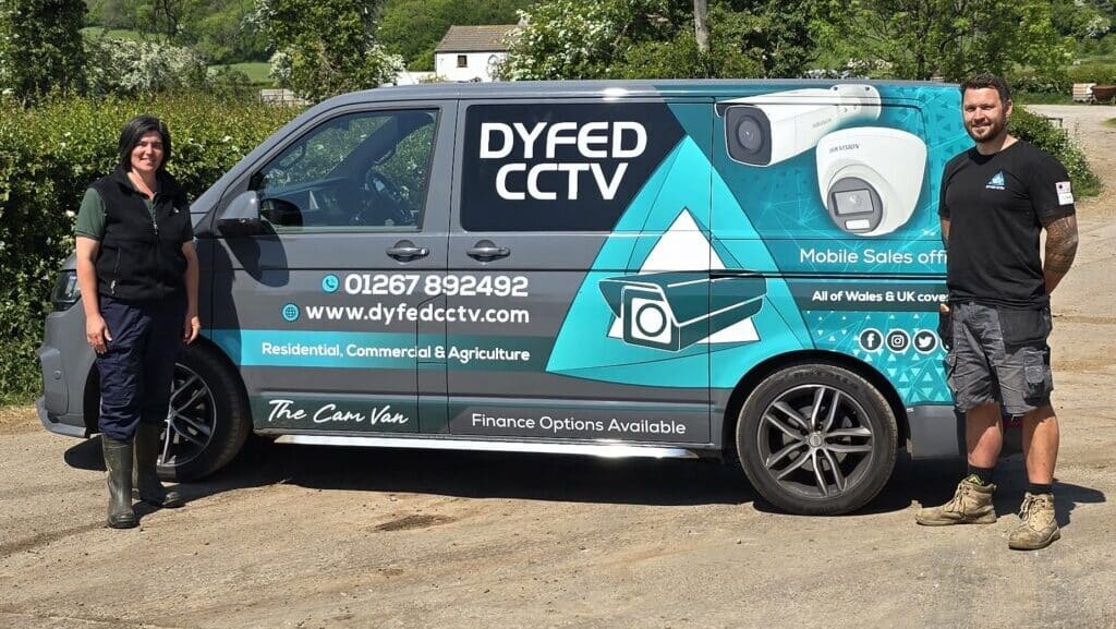 Dyfed CCTV engineers beside a company installation van
